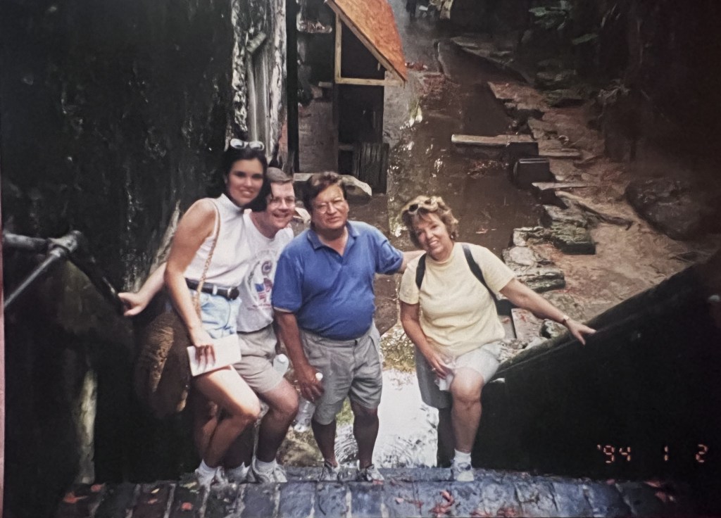 This is a photo of us and our precious friends Kathy and Pierre at the Queens Staircase in the mid-90s. 